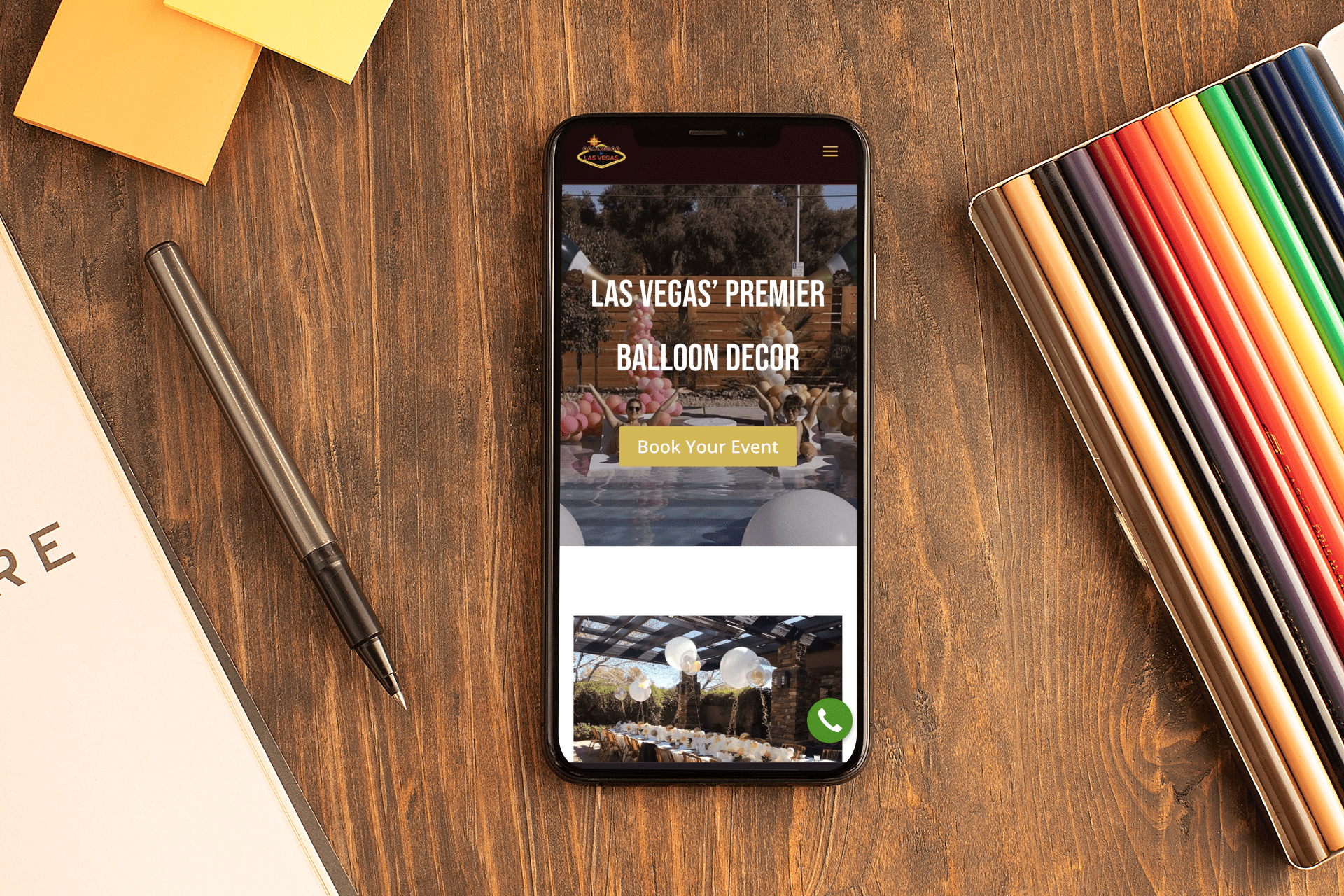mockup-of-an-iphone-xs-max-surrounded-by-office-supplies-25390